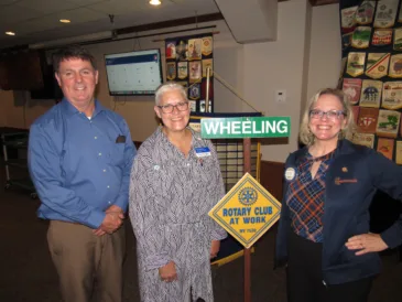 Rotary Club District Governor Julie Sawyer Offers A Helping Hand to Wheeling Rotarians